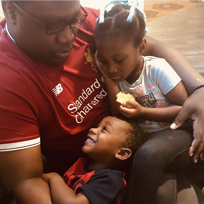 Emmanuel Arowolo with his kids