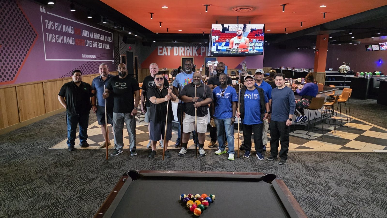 ADSC members gathered at the pool hall